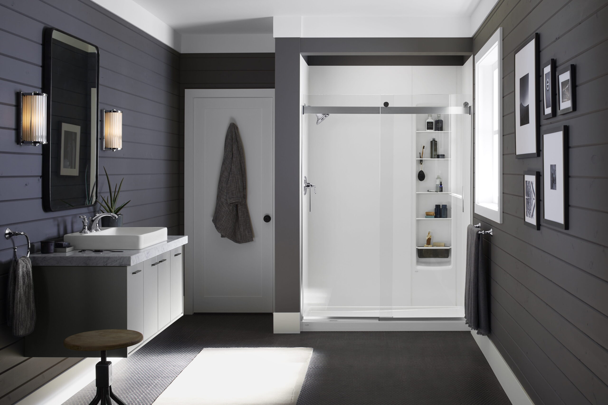 Walk-in shower with glass door in modern bathroom