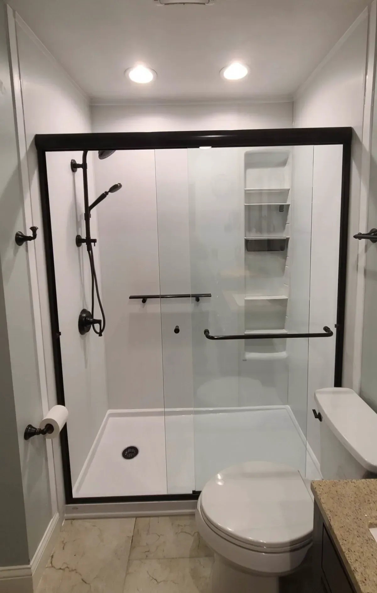 Accessible walk-in shower with grab bars