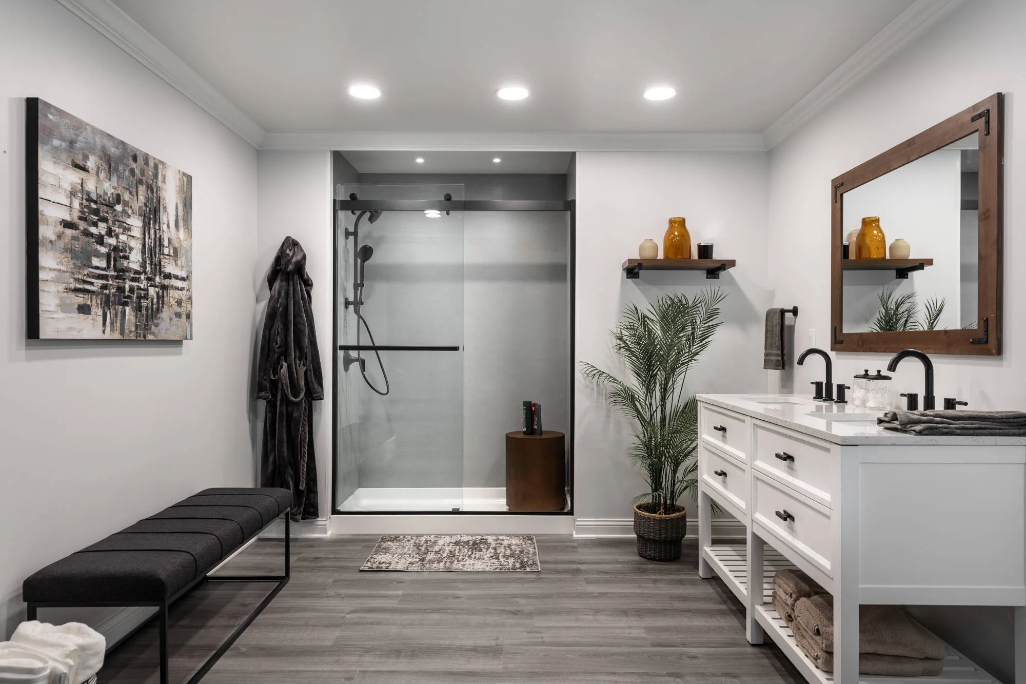 Modern bathroom with double sink vanity and walk in shower