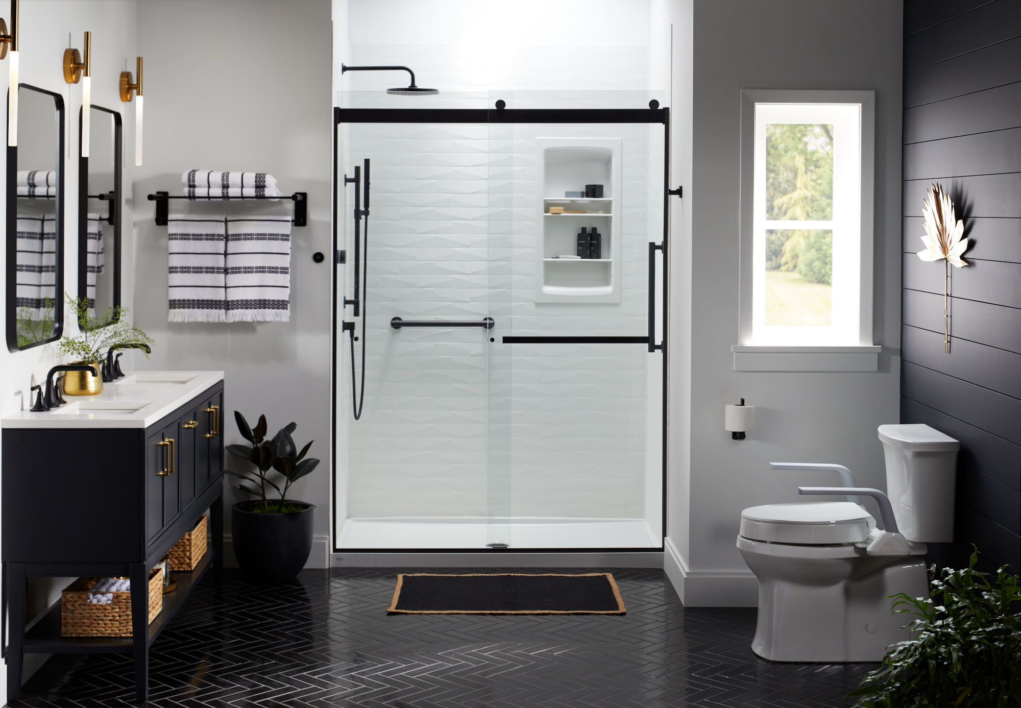 Modern bathroom with a walk-in shower featuring black hardware and a built-in shelf