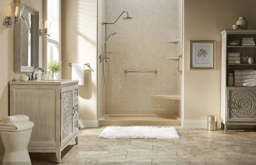 Beige bathroom with a tub-and-shower combination and vanity