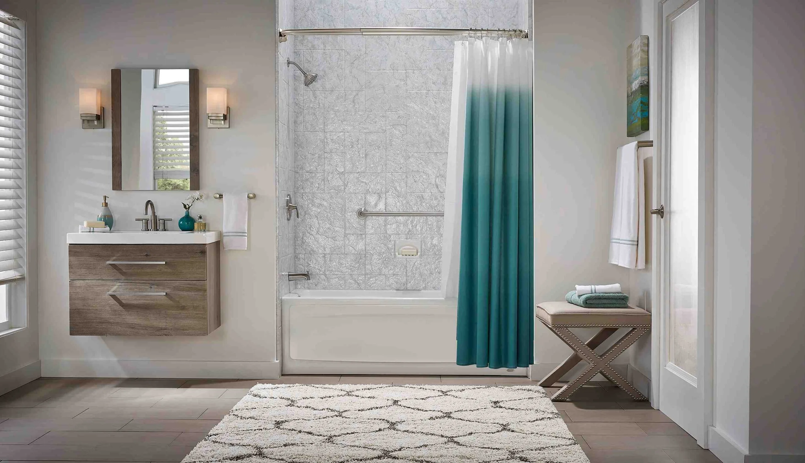 Bathroom with gray stone shower surround and teal shower curtain